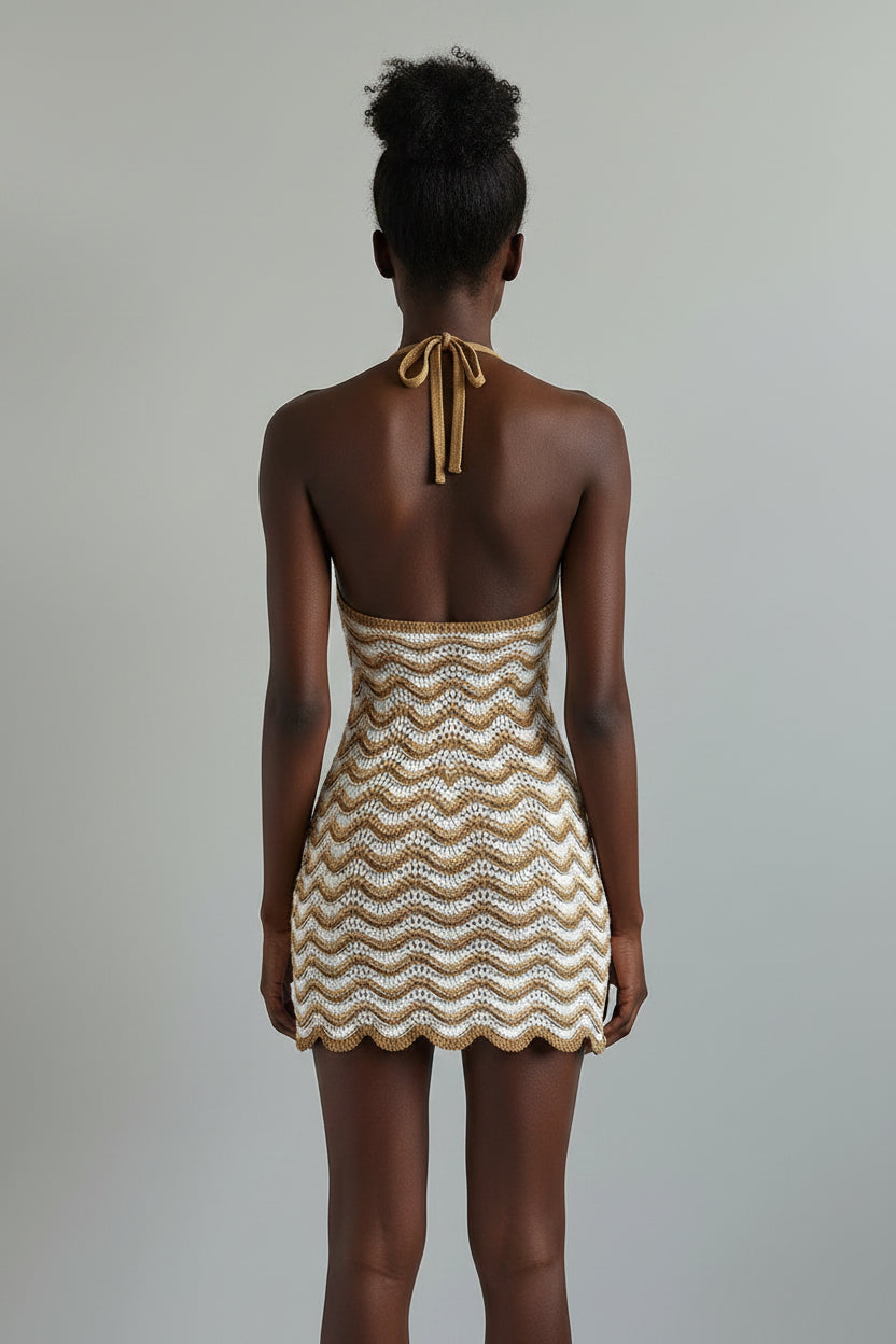 Woven dress on a mannequin against a beige background