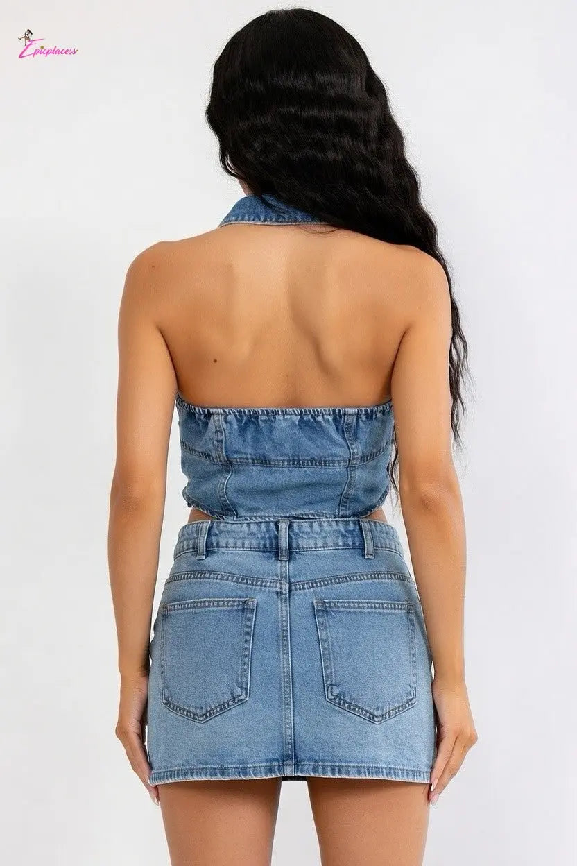 Woman wearing a denim strapless top and skirt set on a white background