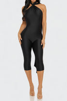 Black halter top and capri pants set on a white background