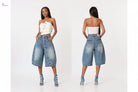 Woman wearing a white strapless top and blue denim shorts from front and back views on a white background.