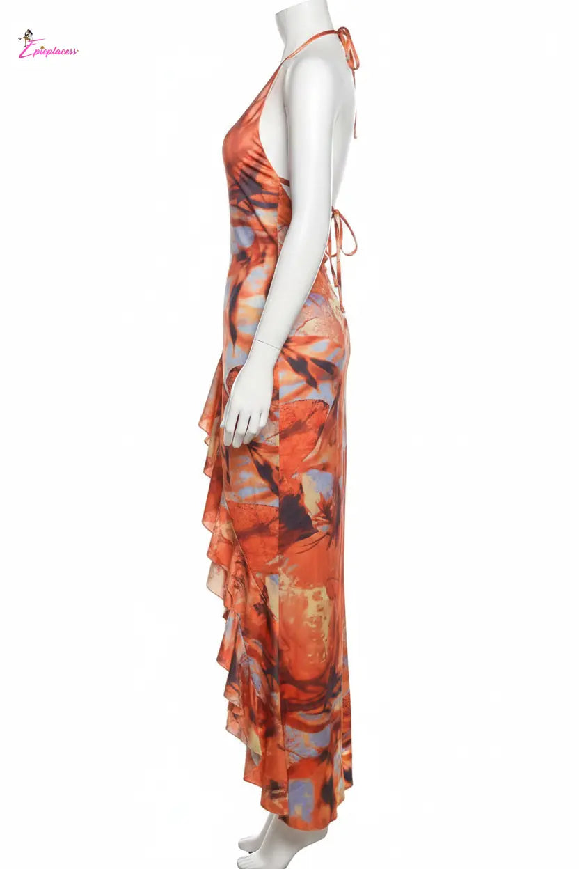 Orange abstract floral halter maxi dress - side view
