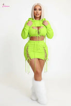Neon lime green lace-up crop top and mini skirt set - front with hood