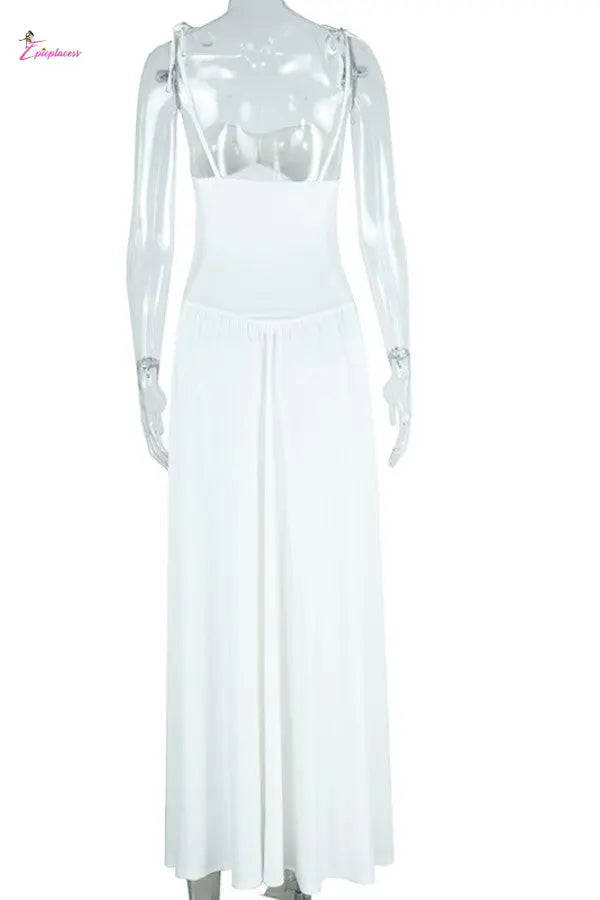 White dress with sheer sleeves on a white background